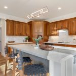 12. Feauturing Qaurtz Countertops & Custom Island